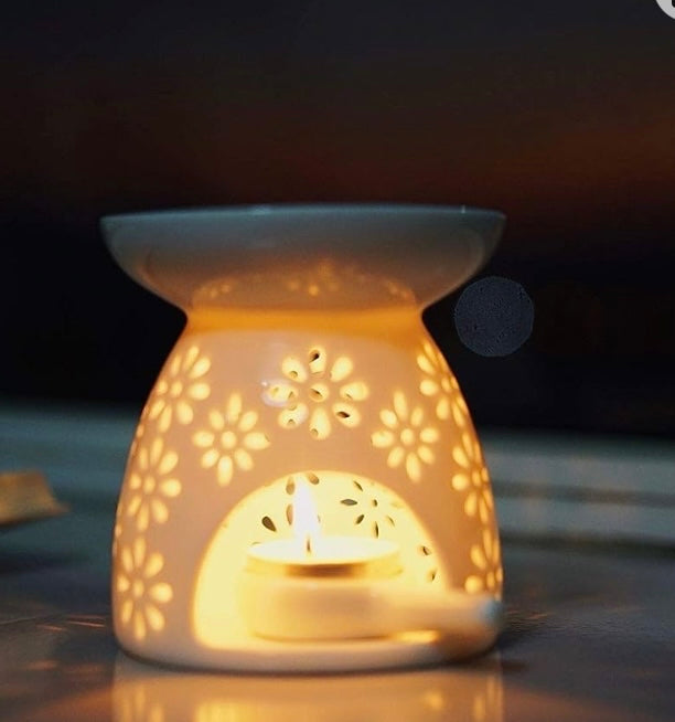 Aroma Duftlampe aus
Keramik mit Kerzenlöffel weiß